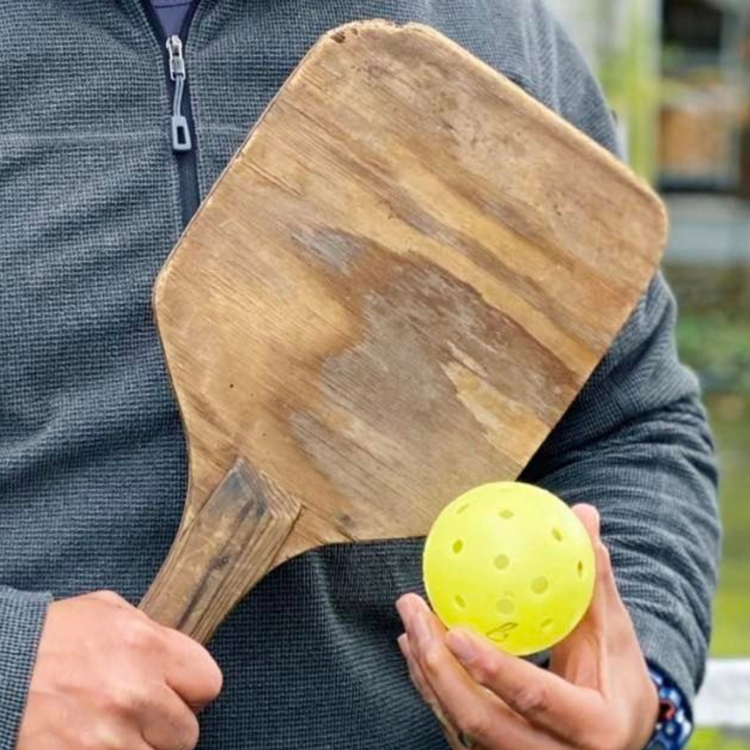 First pickleball paddle and ball